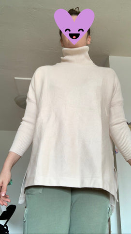 Women's Long Turtleneck Sweater with Asymmetrical Hem