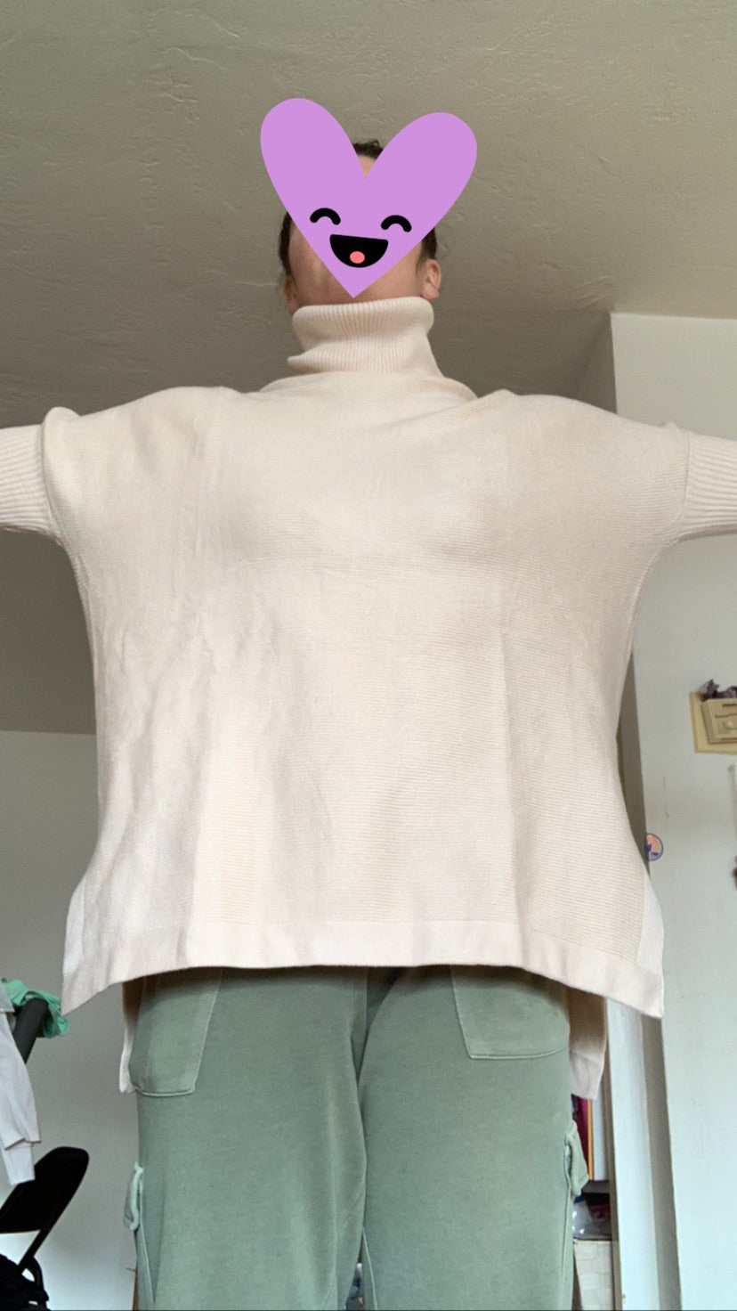 Women's Long Turtleneck Sweater with Asymmetrical Hem